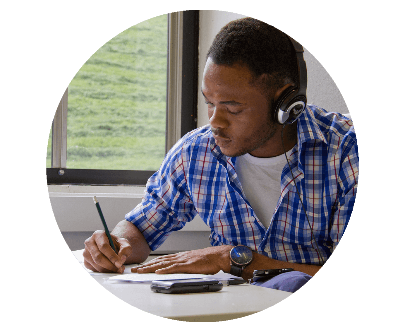 Image of a student making notes