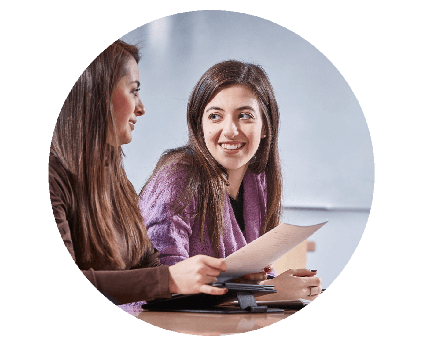 Image of two students in a tutorial